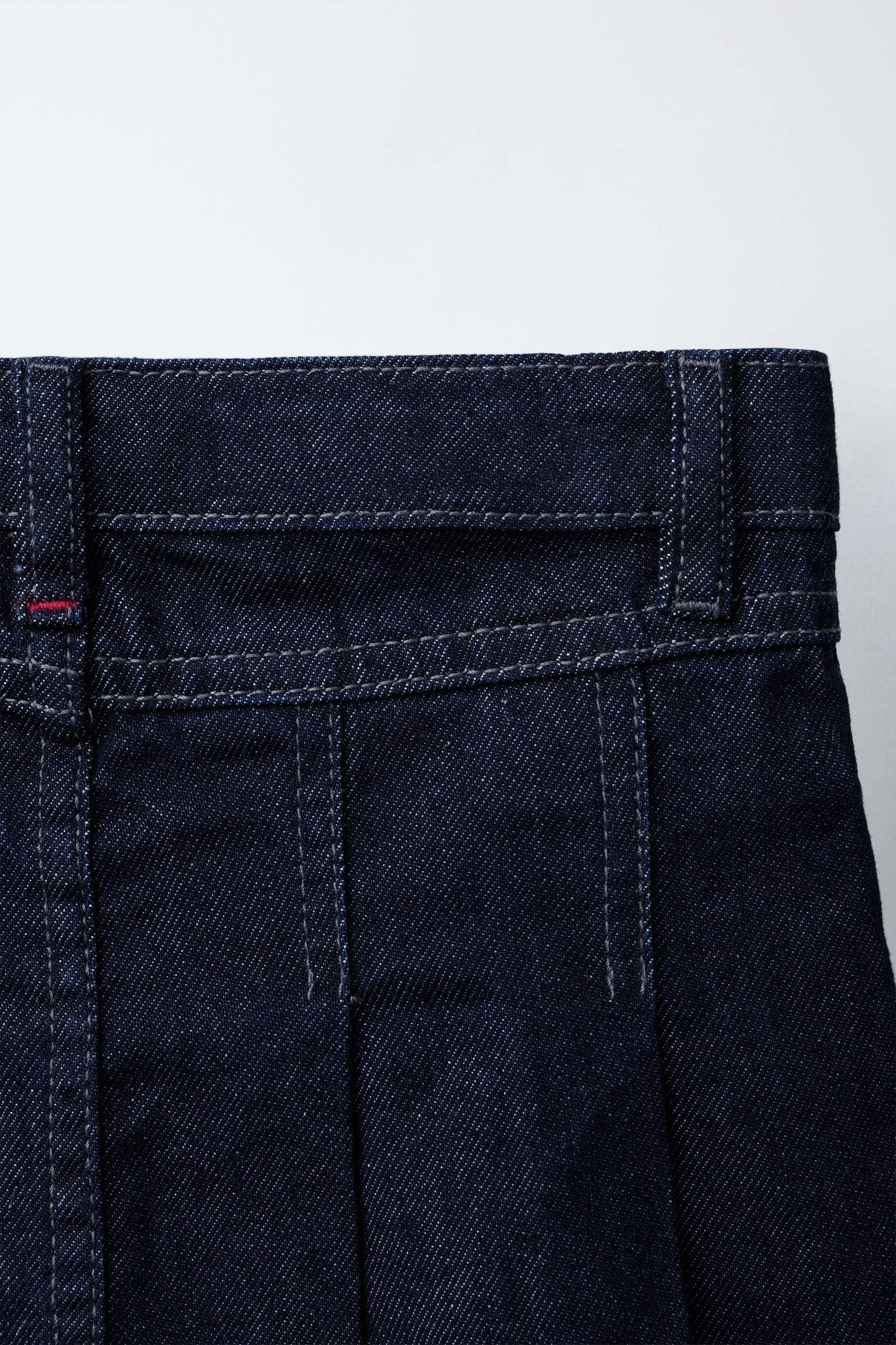 PLEATED DENIM SKIRT